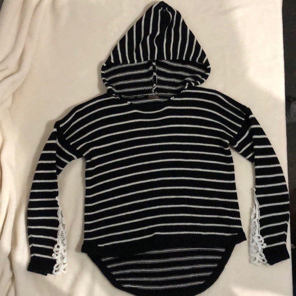 A sweater with a hood